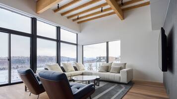 Chalet, 4 Bedrooms, Balcony, Hill View | Living area | 42-inch flat-screen TV with digital channels, TV, Netflix