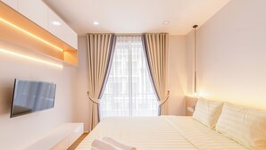 Kamar Single Deluks | Brankas, kedap suara, setrika/meja setrika, dan Wi-Fi gratis