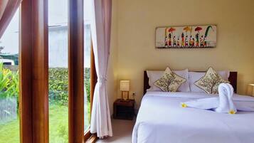 Deluxe Room, Garden View | Individually decorated, individually furnished, desk, free WiFi