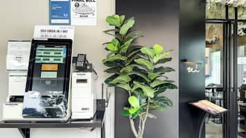 Check-in/check-out kiosk