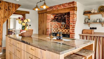 Coffee/tea maker, dining tables, kitchen islands