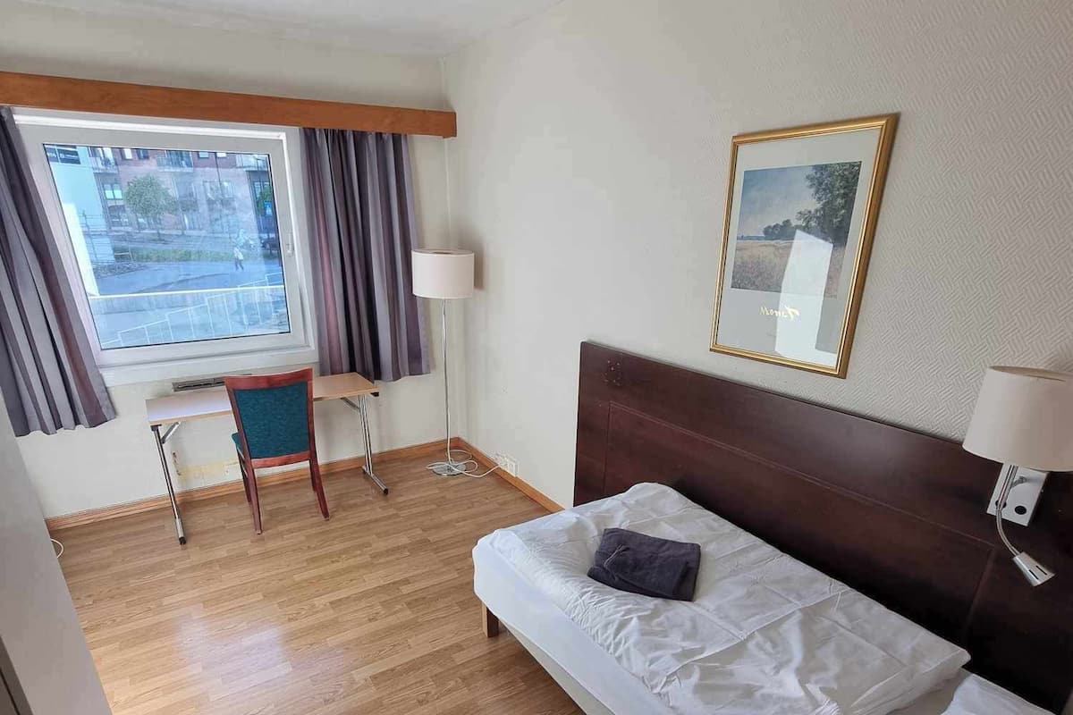 Basic Single Room, Private Bathroom, Courtyard View | Desk, laptop workspace, free WiFi
