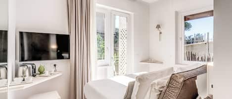 Superior Double Room, Balcony, Courtyard View | In-room safe, soundproofing, iron/ironing board, free WiFi