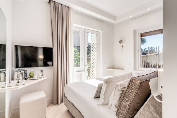 Superior Double Room, Balcony, Courtyard View | In-room safe, soundproofing, iron/ironing board, free WiFi