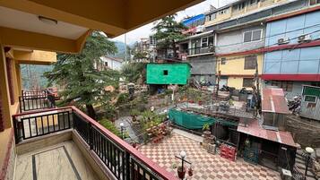 Deluxe Room, City View | Terrace/patio