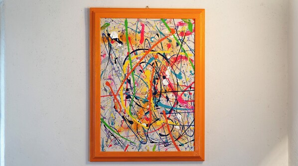 A framed abstract painting with a textured background. - Pedranzini 23 (Bormio)
