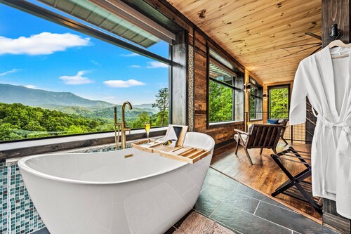 Only rooftop luxury pool chalet in the Smokies. Pool table, sauna, putting green