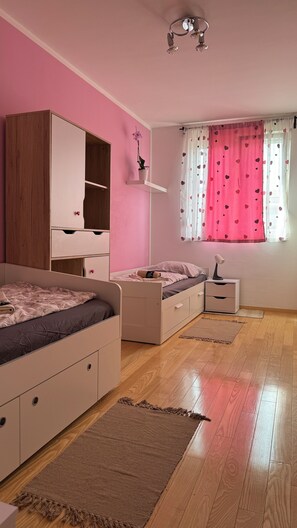 2 bedrooms, soundproofing, iron/ironing board, travel cot