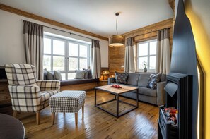 Deluxe-Suite, Balkon | Wohnbereich