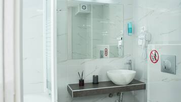 Jetted bath, hair dryer, towels, soap