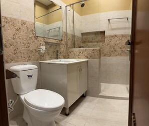 Shower, towels, soap, shampoo