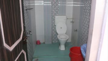 Shower, rainfall showerhead, towels, soap