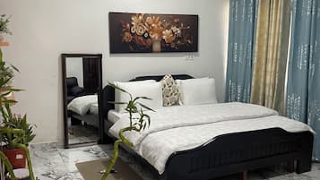 Estudio ejecutivo | Ropa de cama de alta calidad, camas con efecto memoria y minibar