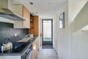 Fridge, coffee/tea maker, electric kettle, toaster
