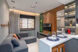 Apartamento superior | Zona de estar
