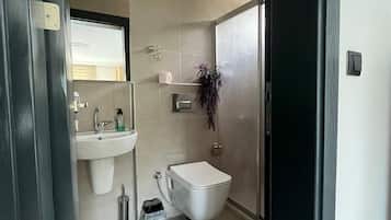 Triple Room, Sea View | Bathroom | Shower, hair dryer, towels, soap
