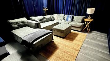 Smart TV, fireplace, foosball, books