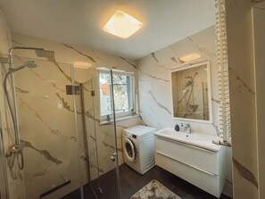 Hair dryer, towels, soap, shampoo