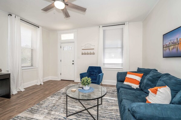 House, Multiple Beds, Balcony (Historic Ludlow Suites) | Living area | 42-inch TV with digital channels