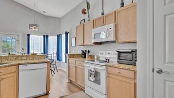 House, Multiple Beds, Pool Access, Pool View (Enchanting Vacation Haven) | Private kitchen | Fridge, microwave, oven, stovetop