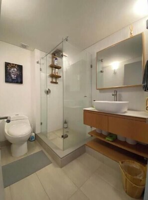 Shower, hair dryer, towels, soap