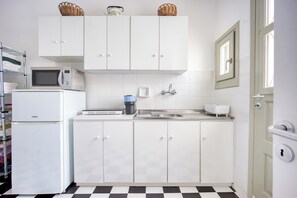 Fridge, microwave, toaster, cookware/dishes/utensils