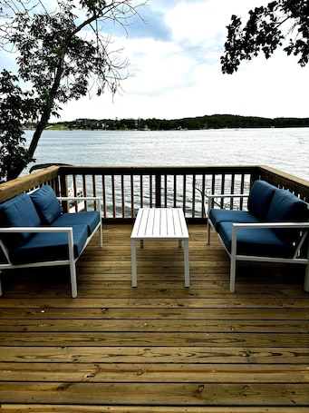 Terrace/patio. Nice and cozy 3-bedroom cabin on Lake Metigoshe - weekly discount