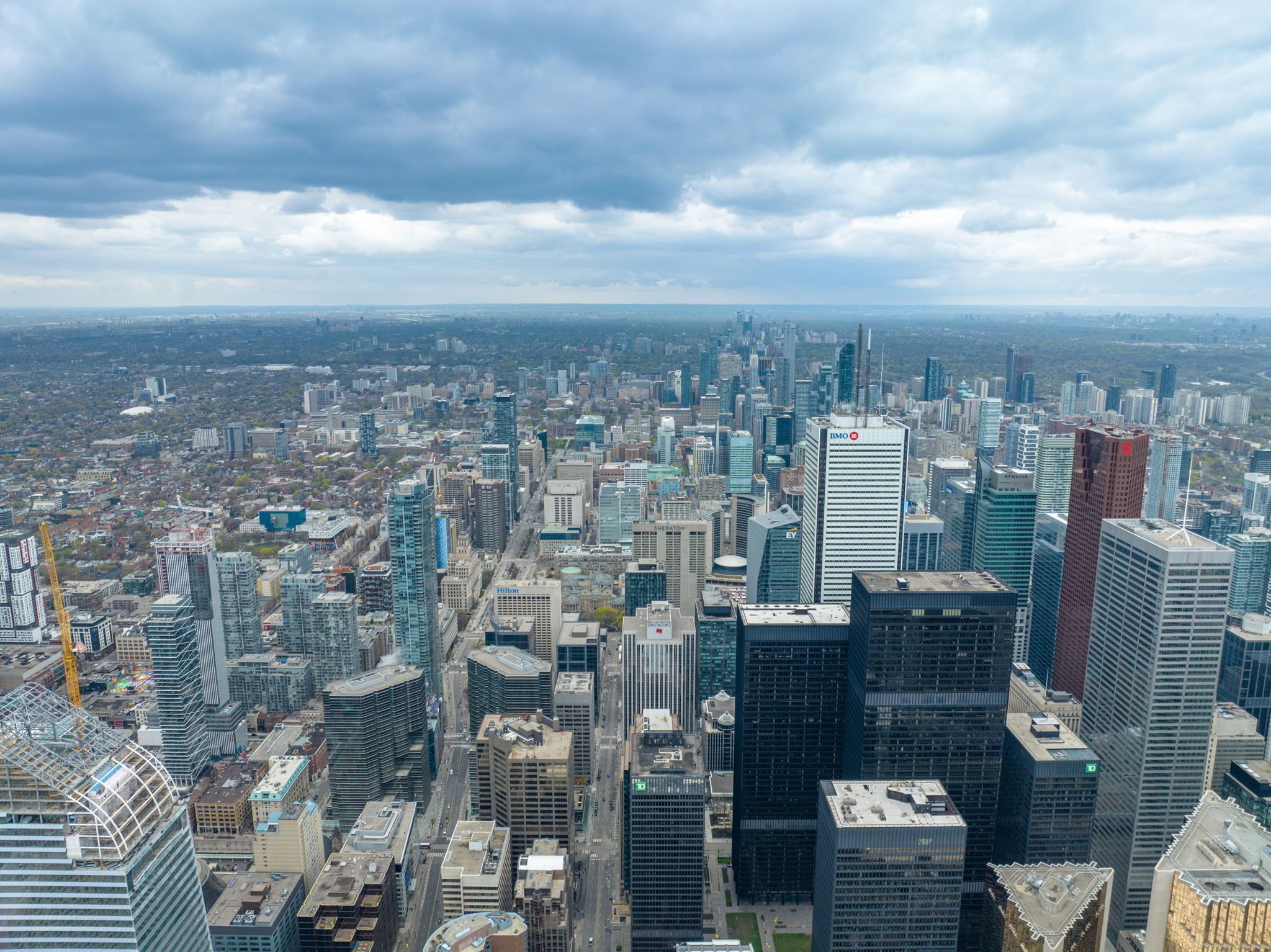 A high-rise cityscape with modern architecture, including a prominent BMO building.