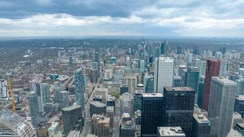 A high-rise cityscape with modern architecture, including a prominent BMO building.