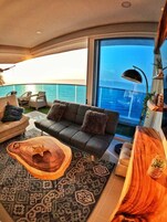 Deluxe Penthouse, 3 Bedrooms, Hot Tub, Sea View | Living area | Toys