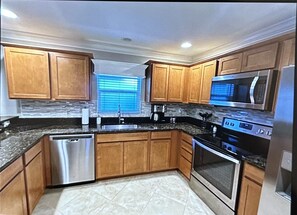 Cookware/dishes/utensils - Exceptional 2 bed 2 bath villa with golf cart, grill & bikes in The Villages, FL (The Villages)