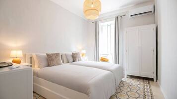 2 bedrooms, desk, iron/ironing board, travel crib