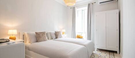 2 bedrooms, desk, iron/ironing board, travel crib