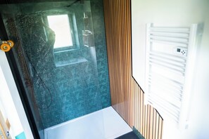 Shower, hair dryer, towels, soap