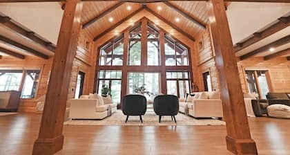 Beautiful Custom Log Home nestled on 300 ft beach front