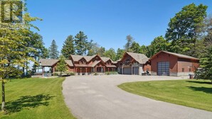 Exterior - Beautiful Custom Log Home nestled on 300 ft beach front  (Beaverton)