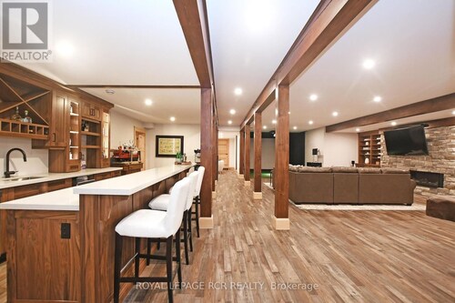 Beautiful Custom Log Home nestled on 300 ft beach front 