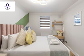 2 habitaciones, tabla de planchar con plancha, cuna de viaje y wifi 