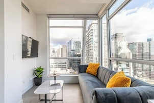 Presidential, City view | Living area | 55-inch Smart TV with satellite channels