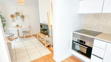 Superior Suite, City View | Private kitchen | Microwave, stovetop, espresso maker, electric kettle