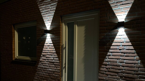 A building with a brick facade, two windows, and a door. - Park View Studio - Features Free Wifi, Bright Furnishings and Modern Facilities (Nijmegen)