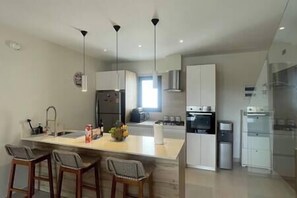 Fridge, microwave, oven, stovetop - Luxury Penthouse a few step from the Beach (Punta Cana)