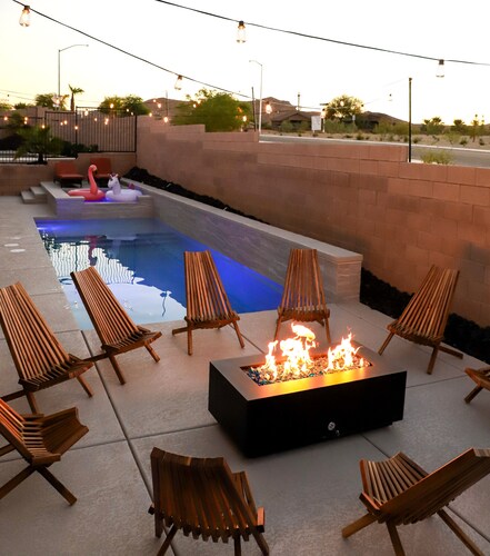 Game Room • Heated Pool & Spa • Fire Pit • Putting Green • Outdoor TV