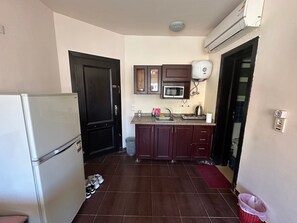 Apartment | Private kitchen | Fridge, microwave, stovetop, electric kettle - Porto Sharm Resort With Sea View Sharm Apartments (Sharm El Sheikh)