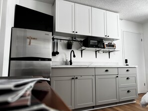 Fridge, microwave, coffee/tea maker, electric kettle