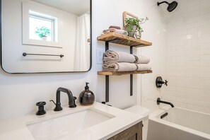 Hair dryer, towels, soap, shampoo