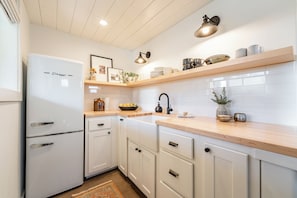 Fridge, microwave, coffee/tea maker, toaster