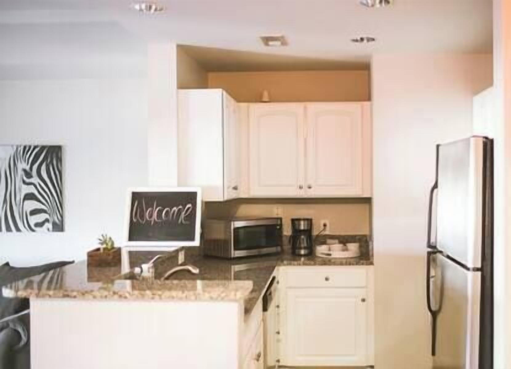 A Cozy uptown retreat, walkable to everything.