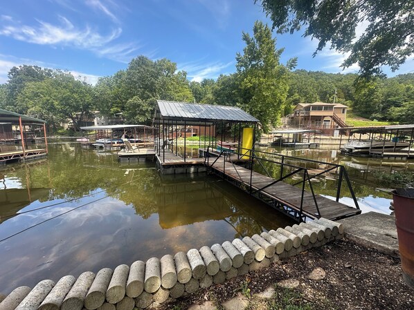 Property grounds - Charming 3 bedroom, 2 bath house with dock & outdoor spaces in Sunrise Beach. (Sunrise Beach)