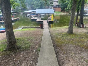 Property grounds - Charming 3 bedroom, 2 bath house with dock & outdoor spaces in Sunrise Beach. (Sunrise Beach)